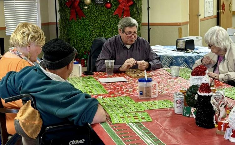 With the holiday spirit in the air, City of Memphis Mayor Joe Davis, along with Memphis City Manager Jack Owens, join Memphis Convalescent Center residents for a few rounds of bingo Wednesday, Dec. 17.