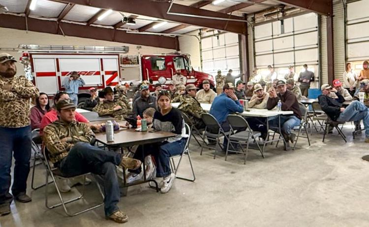 The crowd waits in anticipation for the winners of Wellington Volunteer Fire Department’s Third Annual Varmint Hunt fundraiser to be announced.