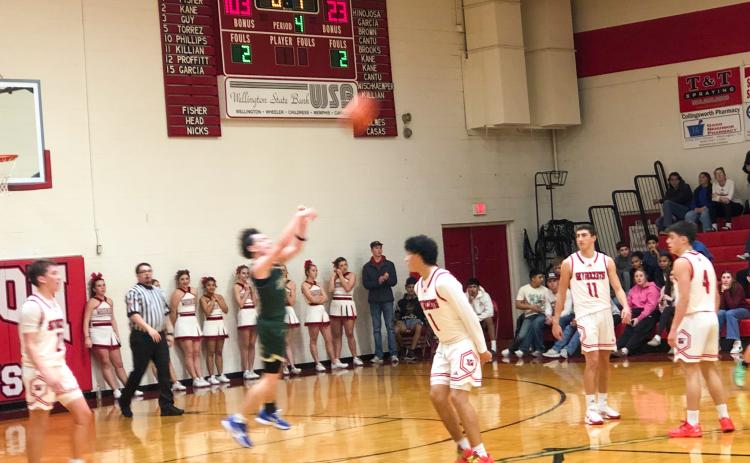 The Highland Park Hornets hoist the ball toward the goal at the sound of the buzzer Thursday evening, Jan. 22 in Wellington, securing the Wellington Skyrockets’ 103-23 win.
