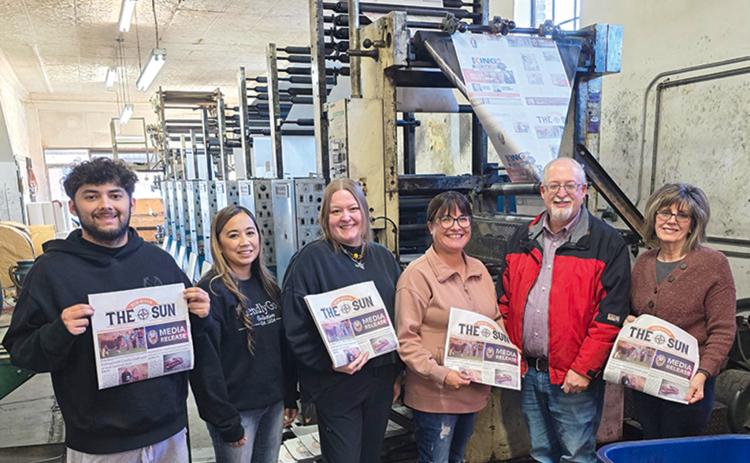 The Red River Sun staff enjoyed a tour of Community Printers, located in Shamrock, last Wednesday, Jan. 21, where about 30 area newspapers are printed. The staff observed and learned more about the entire newspaper production process, from platemaking through offset printing. From left: Circulation Director Synghyn Beasley-Vasquez, reporter Shauna Salinas, Managing Editor Elizabeth Tanner, Advertising Manager Tara Allred, Publisher Roger Estlack, Assistant Editor Bev Odom.