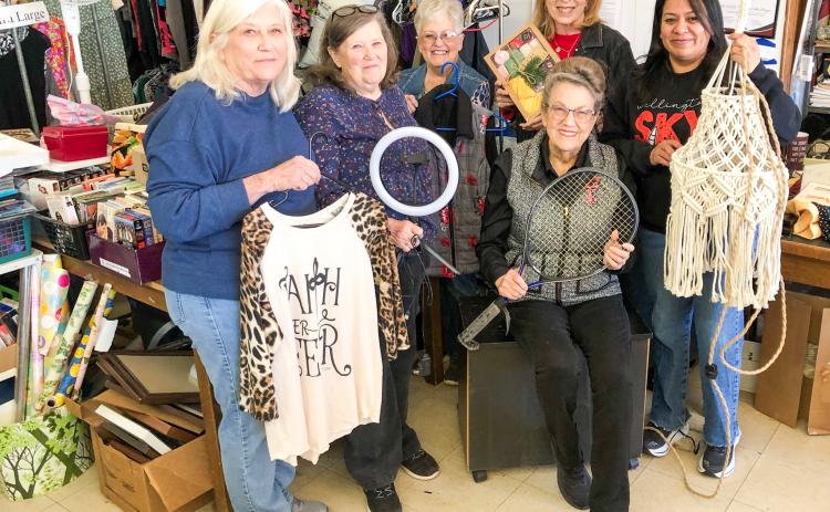 Wellington Endless Bargains (WEB) Board Vice President Sharon Starkey, seated, gathers with board members Monday afternoon, Jan. 12, to sort newly donated inventory. Located at 823 West Ave. in downtown Wellington, WEB marked 10 years in business on Oct. 31, 2025. Back, from left: Treasurer Bonnie Hall, Secretary Phyllis Floyd, Ann Wauer, President Lennie Statham, Maria Skelton. Not pictured: Mike and Debra Belew.