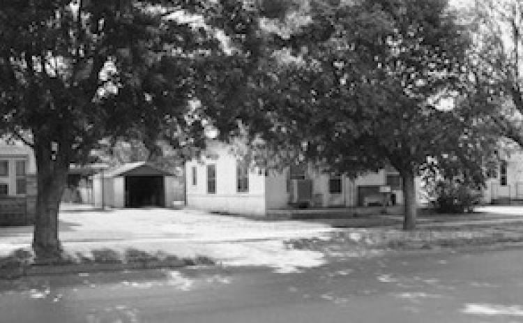 Jim Leggitt’s childhood home, located at 1106 West Ave., is pictured as it stands in August 2003. A walnut tree stood at the back corner of the property, near the garage. The front trees were yet to be planted, and the roof had previously been flat.