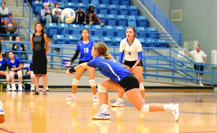 Childress’ Sophie Stephens(5)sends the ball over the net during the Lady Cats’ previous win over Dalhart. Photo Courtesy of Childress High School Yearbook Staff