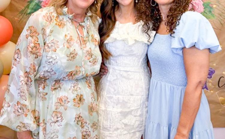Bride-to-be Cali Pontnack gathers with her future mother-in-law, Ashley Long, left, and her mother, Linda Pontnack, on Sunday afternoon, April 12, at the Lewis Building venue. COURTESY PHOTO