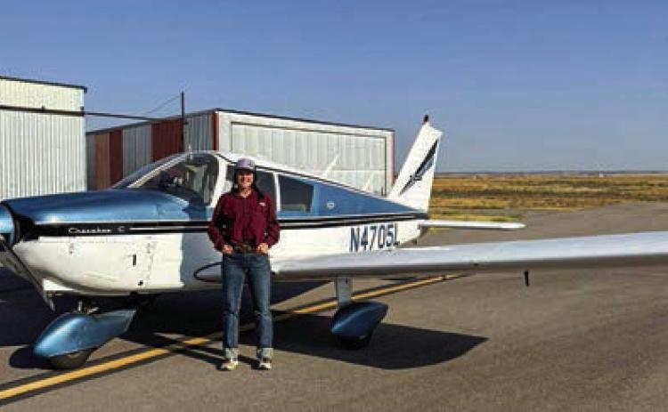 Finding a perfect blue sky and being a focused young lady combine for Wellington High School junior Kenady Skelton’s first solo flight Saturday morning, Sept. 7. Courtesy Photo