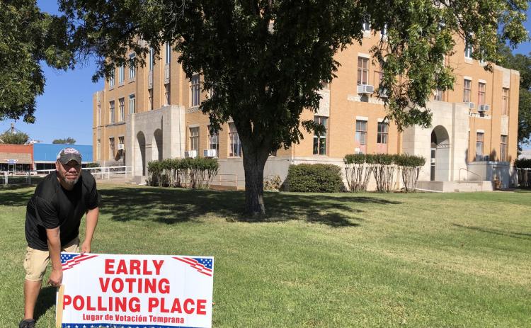 Collingsworth County Courthouse custodian June Herrera posts the early voting signs on Monday, Oct. 20. Early voters can cast ballots for the Constitutional Amendment Election through Friday, Oct. 31. Election Day is Tuesday, Nov. 4. The Red River Sun/Bev Odom