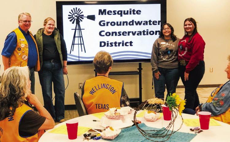 Lion Neal Odom, left, welcomes program presenters Whitney Wiebe, General Manager of the Mesquite Groundwater Conservation District, and Anna Granadoz and Jacy Lampe, Texas 4-H Water Ambassadors, for a recent meeting of the Wellington Lions Club. The Red River Sun/Bev Odom