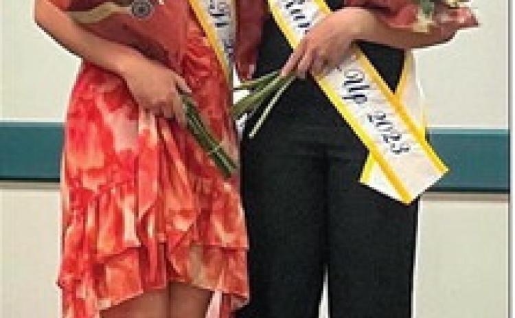 Wellington Lions Sweetheart Summer Owens, left, accepts the honor of 2023-2024 District 2-T1 Queen during the contest Sunday, April 2 in Amarillo. Judges chose Memphis Lions Sweetheart Maggie Cook as runner-up. Courtesy Photo