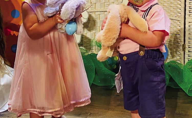 Tiny Tot one-year-old winners Everly Mae Harris and Legend Izayah Cantu.