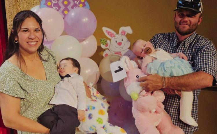 Eight-month-old Knox Storm Smith, son of Roxanne and Mason Smith, and 5-monthold Remington Charlene Renee James, daughter of Kristen and Kody James, serve as the 1-11-Month-Old winners in the Sunday, April 7 Tiny Tot Revue. Courtesy Photos