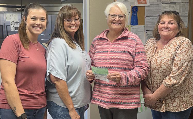 Members of the Hall County TX Picnic Corporation recently presented two checks to the local Hall County Home Delivered Meals program last week. One check, totaling $263 represented proceeds from the Hall County Picnic Car Show, while a second check, totaling $500 was given by a generous donor. Pictured left to right are Kenzy Middleton, President; Melody Middleton, Committee Chairman; Kila Manuel, Hall County Home Delivered Meals Director; and Cindy Woodard, Secretary. COURTESY PHOTO