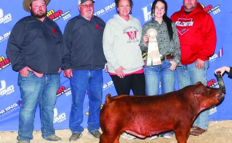 Wellington High School junior Kenady Skelton brings home a 10th place in the Duroc Barrow division of the recent San Antonio Stock Show &amp; Rodeo. From left: Colby Newbrough, Dave Newbrough, Carrie Skelton, Kenady Skelton, Chad Skelton. Photo Courtesy of Collingsworth County Livestock Association