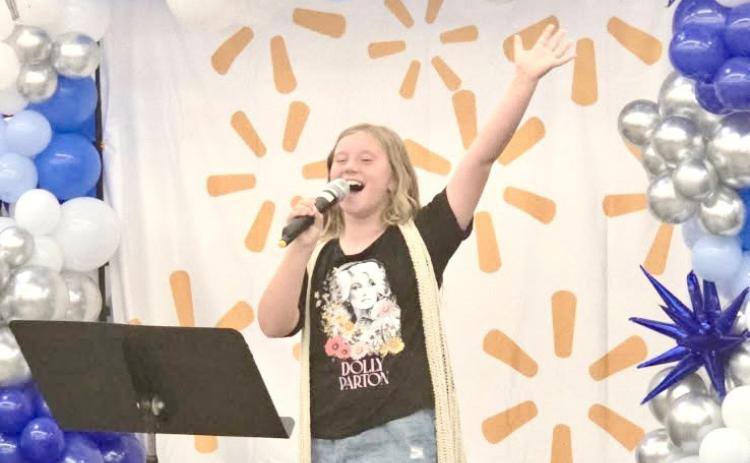 Monson Music Studio’sWillis performs at Walmart grand re-opening