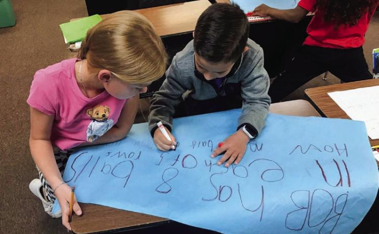 Third grade teams up to write multiplication stories