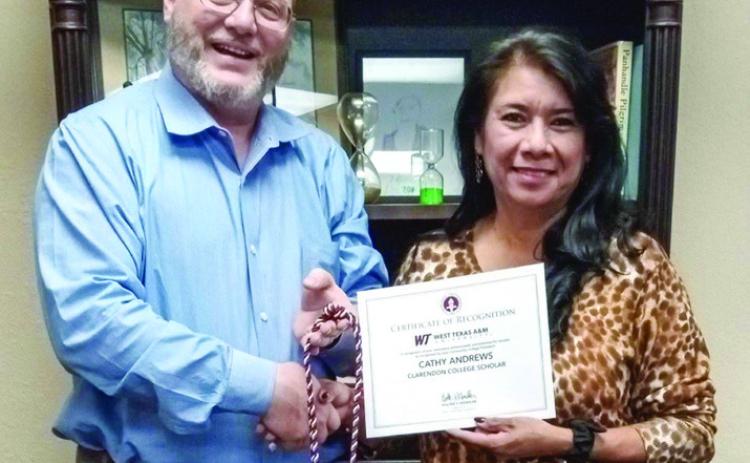 Cathy Andrews, of Wellington, receives commendation from West Texas A&amp;M University as one of five Clarendon College (CC) students designated as Community CollegeScholars.CCPresidentTexBuckhaults bestows Andrews with the honor. Photo Courtesy of Clarendon College