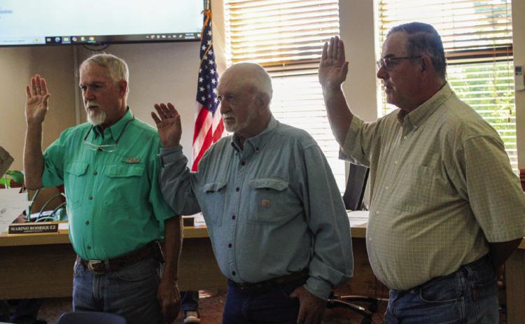City of Childress Attorney Steve Bird swears in Alderpersons Ronnie Shoffner, Place 3, C.T. Taylor, Place 2, and Gary Clark, Place 1, Monday, May 11 in the City of Childress Council Chambers. The Red River Sun/Elizabeth Tanner