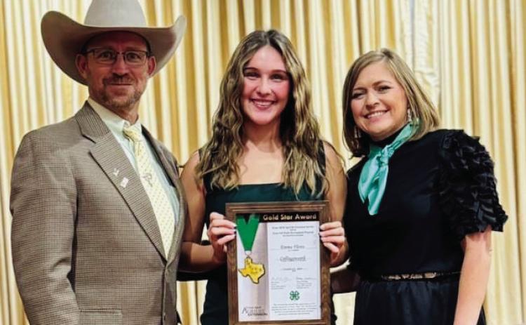 Collingsworth County 4-Her and Wellington High School senior Emma Flores, center, accepts the Gold Star Award at the District 1 4-H Gold Star Banquet on Monday, Oct. 21 at the West Texas A&amp;M University Alumni Banquet Facility in Canyon. The Gold Star Award is the highest achievement that can be accomplished in Texas 4-H. District 1 Extension Administrator Josh Brooks, left, made the presentation. District 1 4-H Specialist Tina Bryant congratulates Flores. Photo Courtesy of Collingsworth County 4-H
