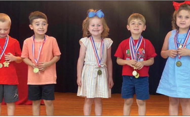 Megan Wischkaemper’s pre-kindergarten students accept awards as follows. From left: Ben Lemons, Perfect Attendance; Lincoln Mayer, Most Improved; Kollins Jones, American Citizenship; Damien Page, Most Improved, Perfect Attendance; Sherree Ballinger, American Citizenship. Courtesy Photos
