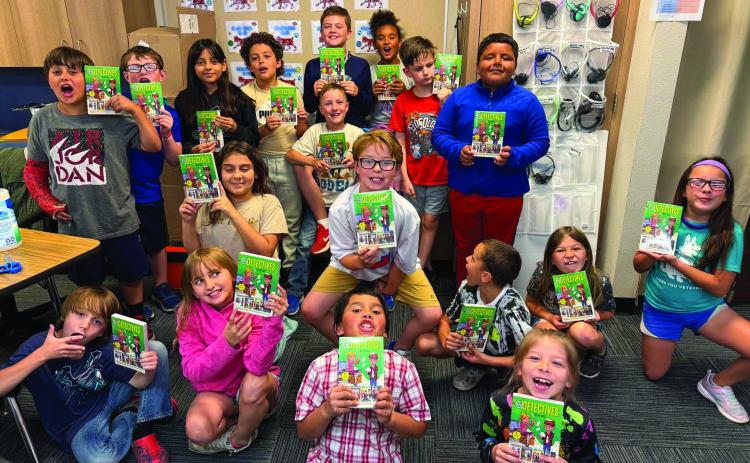 Fundraiser equips students with take-home summer reading material