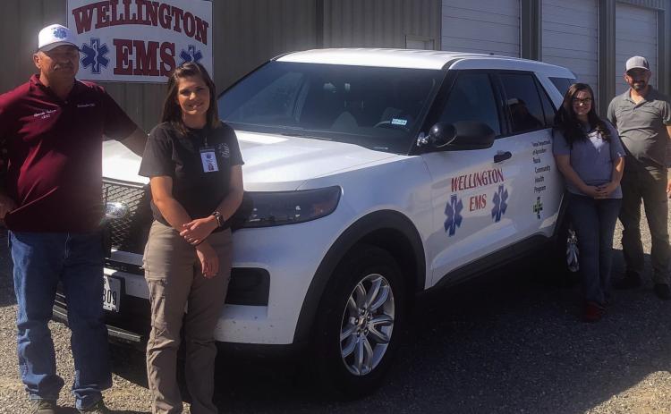 Wellington Emergency Medical Service (WEMS) sports its new, hybrid, all-wheel-drive, utility SUV provided by the Rural Community Health Program. Visit the upcoming health fair for a closer look at the Ford Police Interceptor. From left, WEMS Administrator Farris Nation, Assistant Administrator Samantha Blacksher, Secretary Carle Kemp and President Noah Downing. The Red River Sun/Bev Odom