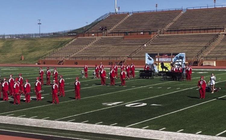 Under the leadership of senior Drum Majors Kali Brewer and Addy Mock, the 60-piece Rocket Regiment performs its 2023 show, “A Night at the Movies,” at the UIL Region 1 Marching Contest Saturday, Oct. 14 at Dick Bivins Stadium in Amarillo. “They earned straight 2s, but this young group has grown so much this year,” said Wellington High School Principal Jermaine Cantu. “We are proud of you.” Justin Mixon and Harley Warrick serve as directors. Courtesy Photo