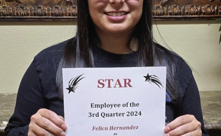 Felica Hernandez, Registered Nurse (RN), accepts the STAR (Service, Teamwork, Attitude and Results) distinction for the third quarter of 2024 for her extraordinary efforts as a member of the nursing staff at Collingsworth General Hospital. Photo Courtesy of Collingsworth General Hospital