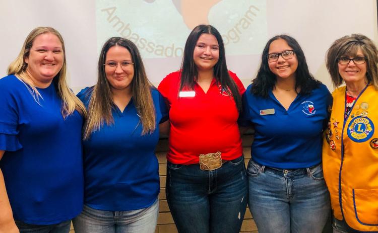 Wellington Lion Bev Odom, right, welcomes Mesquite Groundwater Conservation District Manager Whitney Wiebe, left, and 4-H Water Ambassadors Brecklyn Powell, Jacy Lampe and Anna Granadoz to the recent meeting. Courtesy Photo