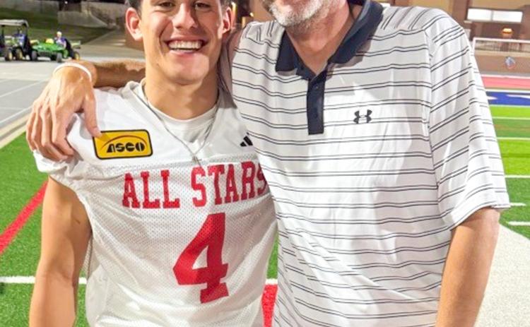 Wellington High School Class of 2026 graduate Noah Cantu assesses the 21st Annual ASCO All-Star Classic outcome with Wellington Independent School District Athletic Director and Head Football Coach Greg Proffitt following the Saturday evening, May 30 contest. WELLINGTON HIGH SCHOOL
