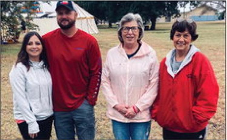 Cassandra Torrez, left, and Ryan Colson win the $250 ice cream freeze off grand prize with Dr. Pepper ice cream. Toni Cummings garnered second place and Shannon West third place. Greenbelt Electric Cooperative, Inc. donated the $250 prize.