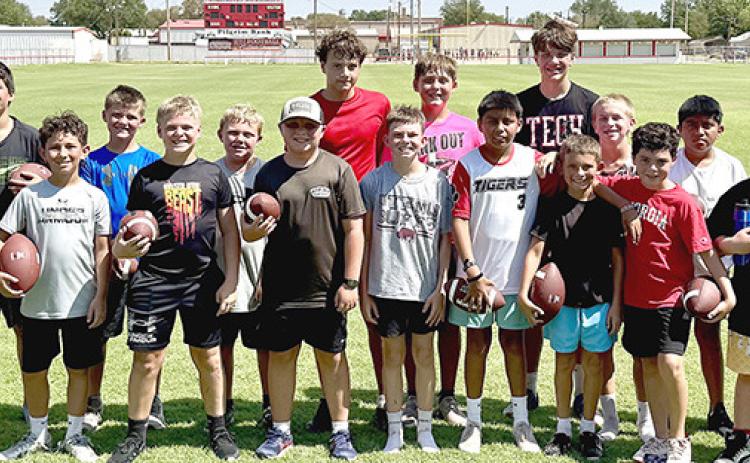 Young Skyrockets learn basic football skills at Wellington