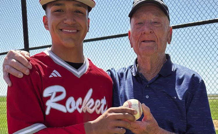 Stallings throws the first pitch to openWellington Little League season