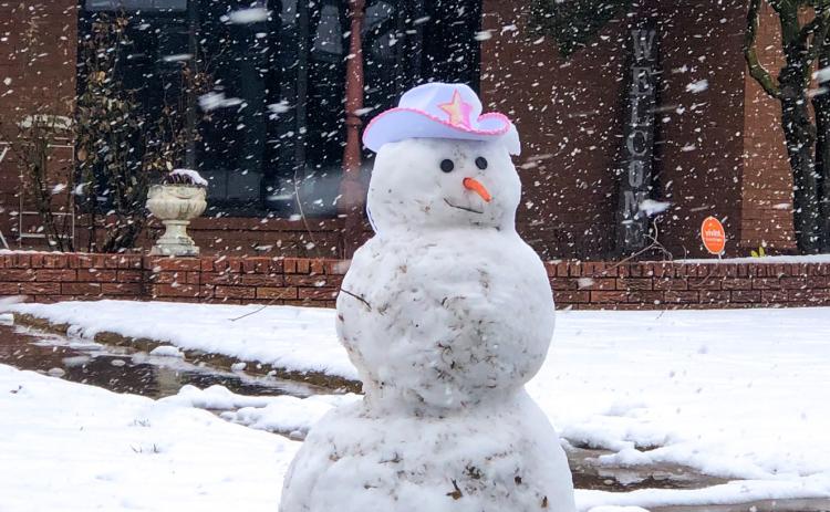 Sunday snow envelops extensive area