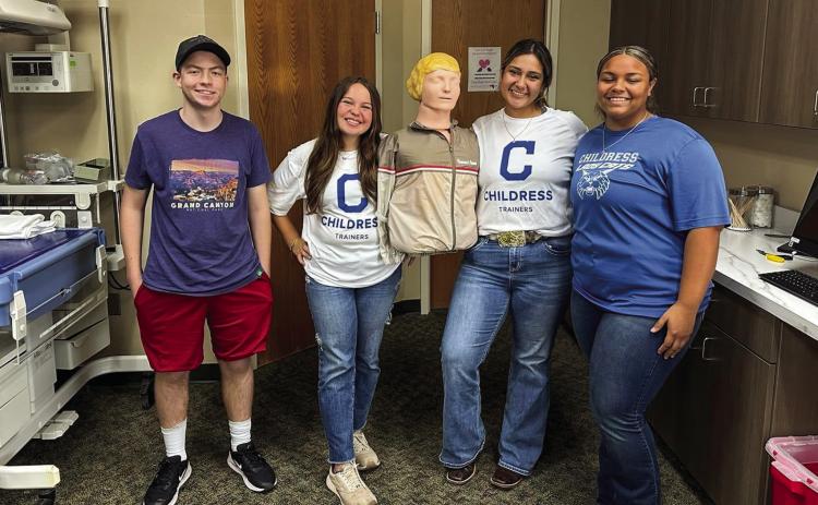 Childress High School student athletic trainers receive Basic Life Support certification, including cardiopulmonary resuscitation (CPR) and automated external defibrillator (AED) training, in preparation for the upcoming season. Courtesy Photo
