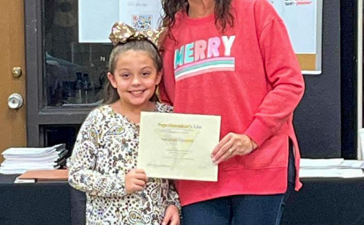 Austin Elementary School third-grader Aaliyah Chacon accepts the Superintendent’s List designation from Memphis Independent School District (ISD) Board of Trustees President Sarah Cook. To make the Superintendent’s list, students must have the highest grade point average in the third-12th grade, along with no absences, tardies or office referrals. Photos Courtesy of Memphis ISD