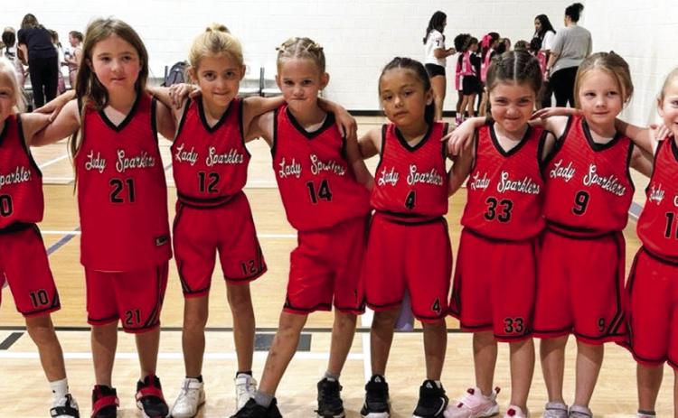 Youth basketball players keep busy schedule