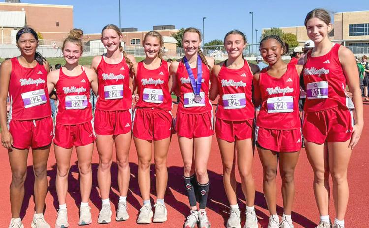 The Wellington Lady Rockets, including Priscilla Marentes, Halle Hedrick, Kaesyn Kane, Ava Kate Inman, Taytum Kane, Claire Kane, Aleah Lewis, and Anna Henard, represent at the Canyon Invitational cross country meet Saturday, Oct. 10. WELLINGTON HIGH SCHOOL