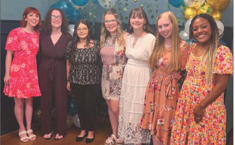 Wedding attendants and friends surround honoree Grace Kiker at her bridal shower on Saturday morning, June 7 at the downtown Wellington Lewis Building. From left: Victoria Kiker, Jalee Davis, Victoria Sanchez, Megan Manning, guest of honor Grace Kiker, Sarah Chadwick and Kira Mickens. Courtesy Photo