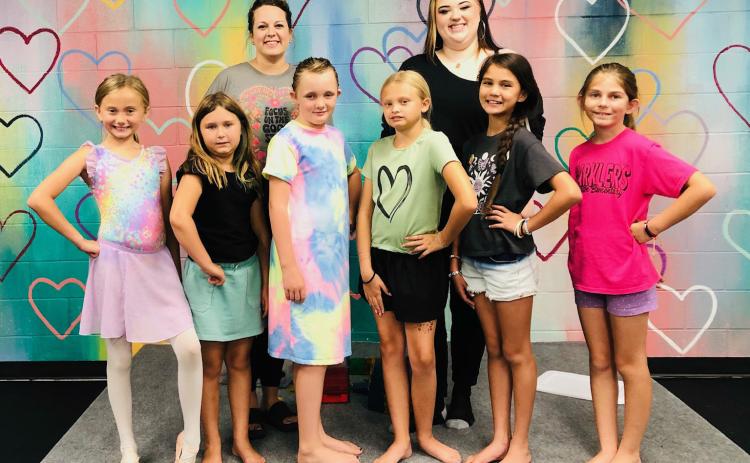 “In My Dance Era” Dance Camp participants in the weeklong summer activity gather Thursday afternoon, June 26 at the Heart of Dance studio in Wellington. Front row, from left: Kadalynn Reeves, Harper Cox, Daisy Owen, Kasyn Cornett, Alora Cantu, Jenna Faulks. Back row, from left: Kacy Cabbell and Cortlyn McKinley. Not pictured: Kodi Cabbell. The Red River Sun/Bev Odom