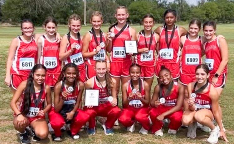The Wellington Lady Rocket and Lady Firecracker cross country teams earn championship finishes at the Second Annual Hollis Cross Country Meet on Saturday, Sept. 6 in Hollis, Okla. Front row, from left: Lady Rockets Sabrina Segovia, Angela Lewis, Taytum Kane, Kobee Lewis, Aleah Lewis, Anna Henard. Back row, from left: Lady Firecrackers Abbygale Torrez, Jessalee Peters, Halle Hedrick, Ava Kate Inman, Kaesyn Kane, Claire Kane, Priscilla Marentes, Evie Henard, Quinn Roberson. Wellington High School