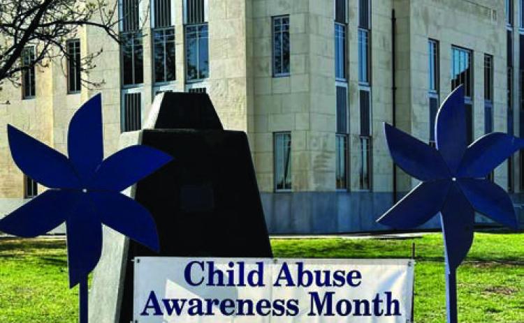 Pinwheels spotted at local courthouses