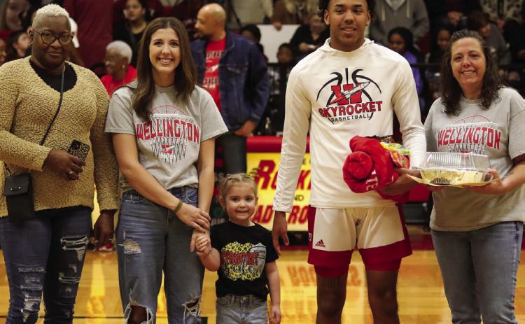 Wellington High School honors its basketball seniors during a special ceremony Tuesday, Feb. 7 prior to the Wellington Lady Rocket versus Clarendon Lady Bronco match. Skyrocket Jordan Nation is the son of Tyran Lewis and April Lindsay, brother of Taylor Souder and uncle of Whitley Souder. He has played varsity basketball for the Rockets for four years. Lukas Wilbur Photography