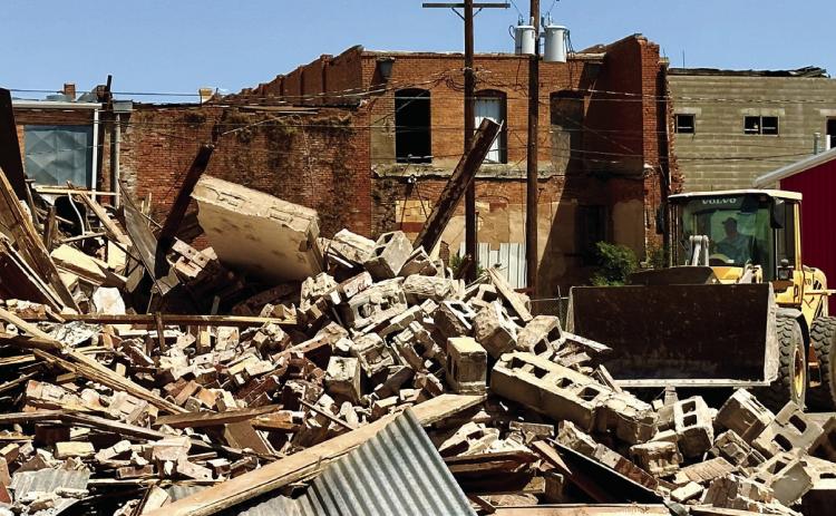 Demolition of 130 Commerce St., which began Tuesday, May 16, continues. The demolition, awarded to AAJ Concrete, of Plainview, will total $87,000. The property, which belongs to the Childress Fire Department, was deemed hazardous to the public in 2022. The Red River Sun/Elizabeth Tanner