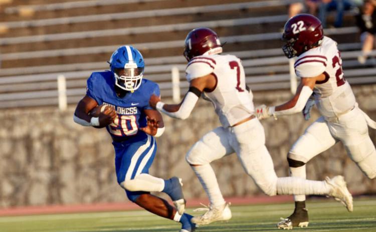 Childress running back Da’Reon Mathis looks for room against the Abernathy Antelopes in a season opener Friday, Aug. 25 at Fair Park Stadium in Childress. Press Pass Sports/Nicole Dill