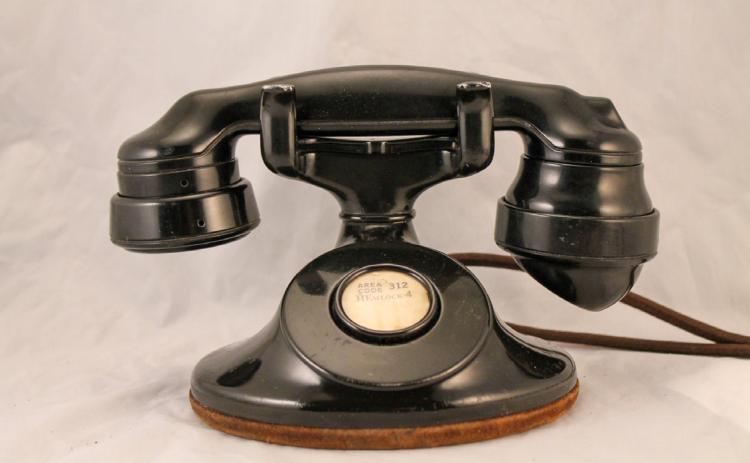 Our home phone (the only kind we had) was located in a nook in the hall in almost the exact center of the house. I don’t remember any dialing mechanism on our home phone… just pick it up and give the operator a name or number. Jim Leggitt Collection