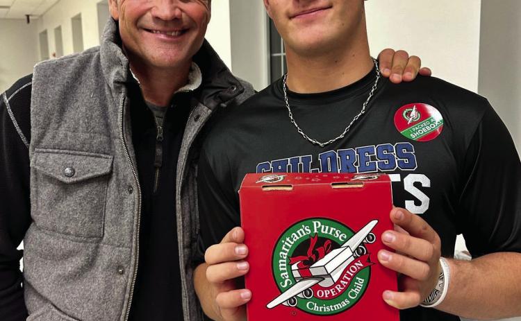 Stran Smith, along with son Scout Smith, pack shoeboxes during First Baptist Church’s 2022 Packing Party Monday, Nov. 14. At the event, volunteers packed 329 boxes, which will be sent to children around the world through Samaritan’s Purse Operation Christmas Child. Additional boxes, containing toys, school supplies and personal hygiene items, can be dropped off at First Baptist Church of Childress, 300 Ave. C NW, through Sunday, Nov. 20. Courtesy Photos