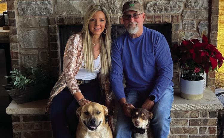 Another destination on the HUGS Holiday Home Tour, Tina and Lee Souder unwind in the elegant outdoor space of their country home.