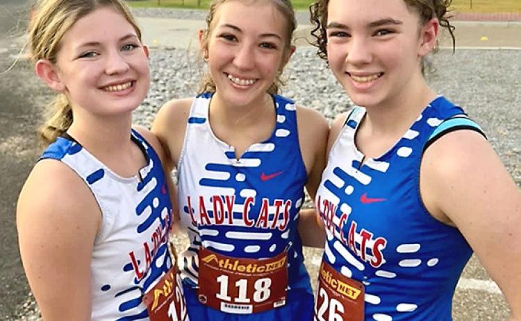 Childress Lady Cats Piper Timmons, Claire Davis and Libby Sanford compete at the 2026 Jeep Webb Classic Saturday, Sept. 5, in Borger. CHILDRESS BOBCAT BOOSTERS
