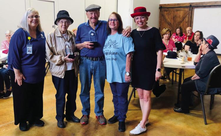 Doris and Harry Stallings receive recognition for 30 years of volunteer service at the Retired Senior Volunteer Program (RSVP) “Hats off to You, Volunteers” luncheon Wednesday, May 15 at the Wellington Senior Citizens Center. From left: RSVP Program Coordinator Christine Beavers, Doris and Harry Stallings, RSVP Volunteer Coordinator Susan Thomason and RSVP Program Director Kaitlin Mosley. The Red River Sun/Bev Odom
