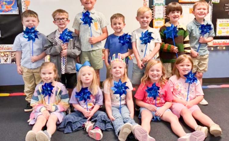 Provided by the Collingsworth County Child Welfare Board, supporting Child Protective Services (CPS), each Wellington Elementary School student received a blue pinwheel, displayed by pre-kindergarten classmates. Wellington Elementary School