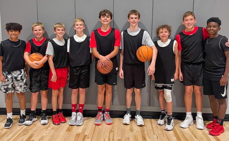 Wellington Junior High Firecrackers Ivan Cruz, left, Miles Ouellette, Damon Keys, Jax Heflin, Jax Cantu, Kyler Keys, Easton Wischkaemper, Cix Killian and TJ Coffee travel to Elk City, Okla., where they made a 5-4 showing in the basketball tournament last week. Photo by Megan Wischkaemper